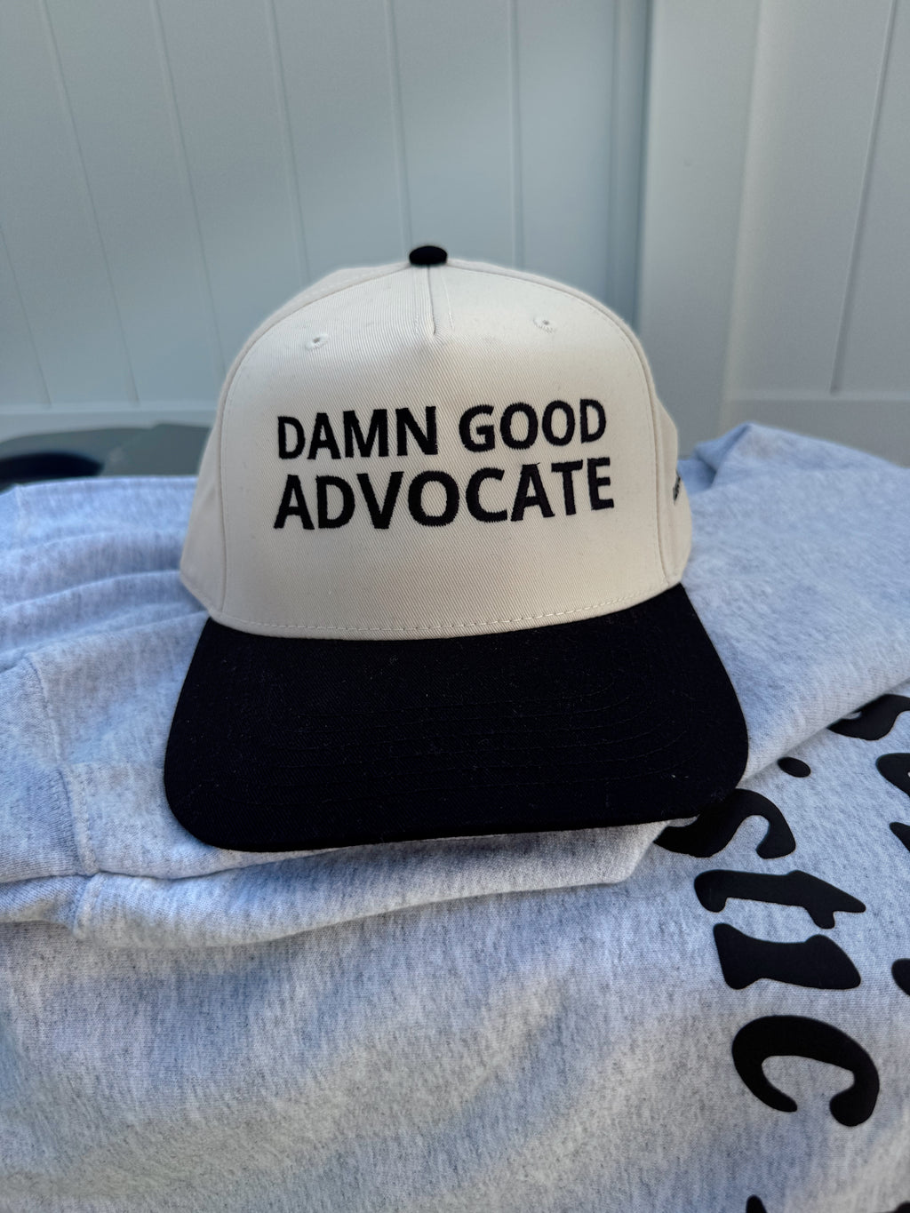 Damn Good Advocate™ Embroidered Hat in Black