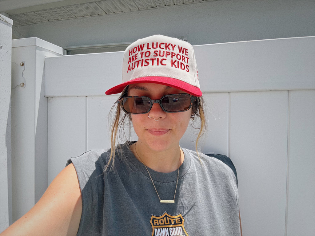 Embroidered "How Lucky We Are" Hat in Red