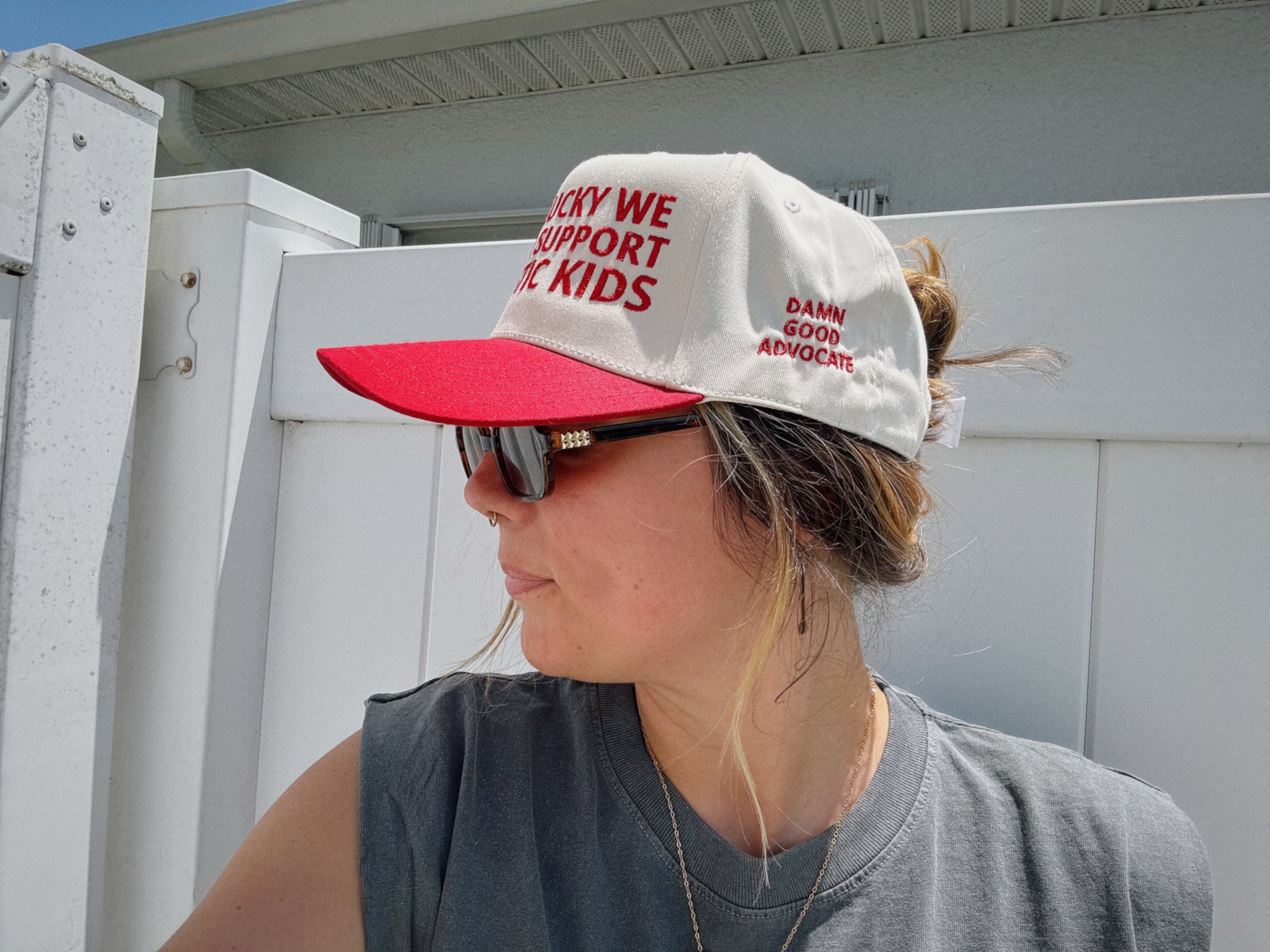 Embroidered "How Lucky We Are" Hat in Red